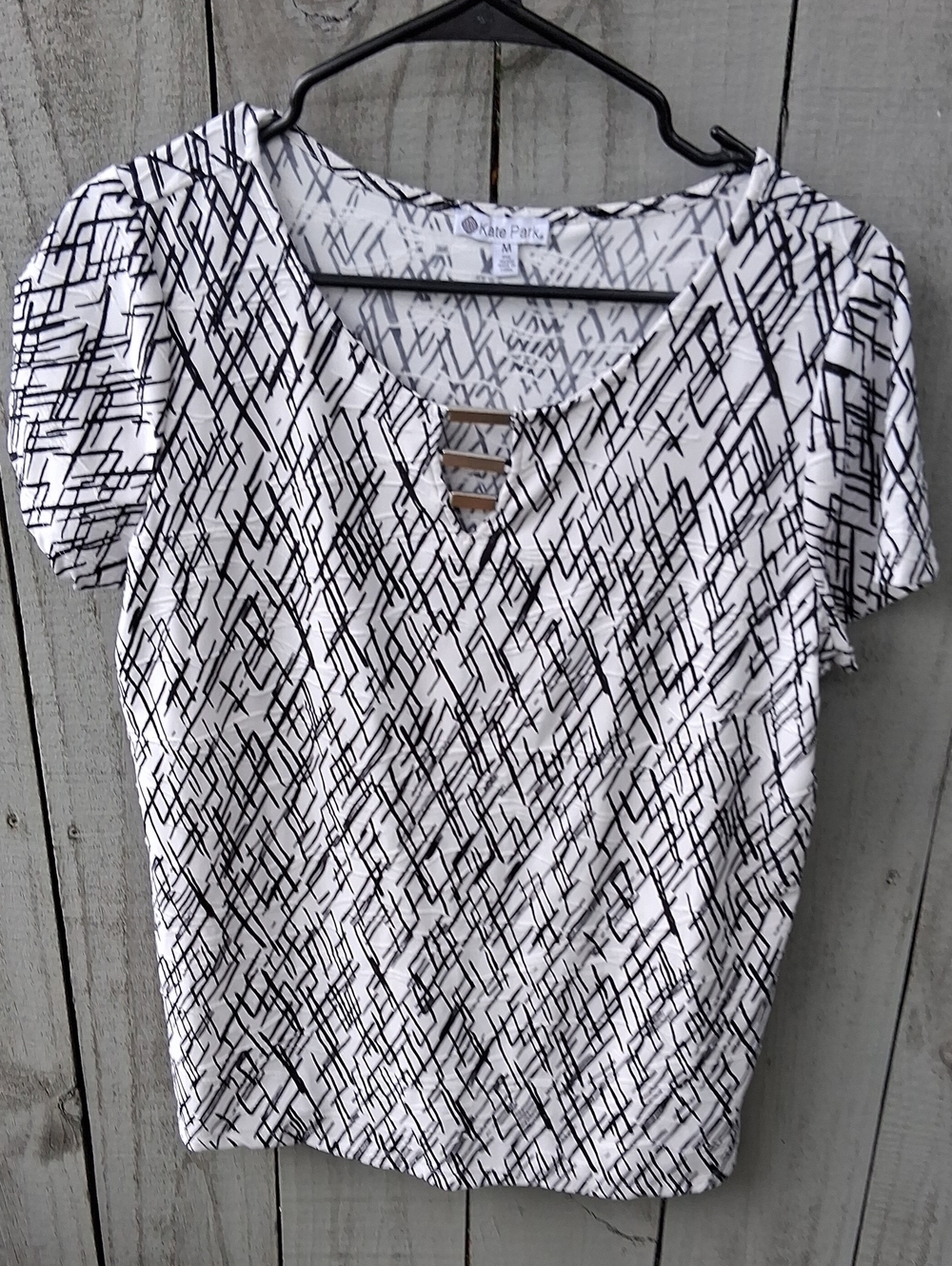 White Short Sleeve Blouse with Black Geometric Print
